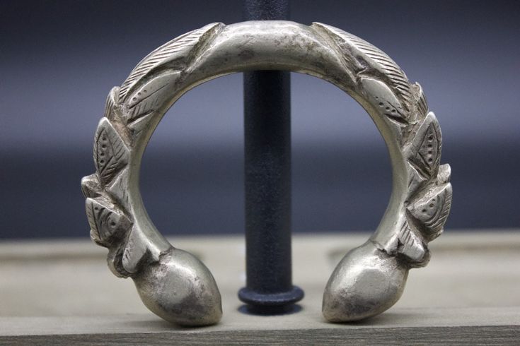 A pair of medium size solid silver Alloy bracelets. These are also called Bunge Bala. It has a thorn-like carving at each end and round polished finials. These are worn by women of various tribal groups for centuries. wt: 264g diameter: 5cm circumference: 13cm origin: Nepal Ceremonial Carved Bracelet Jewelry, Antique Finish Bracelet Jewelry For Ceremonial Occasions, Ornate Silver Hand Cast Jewelry, Antique Carved Jewelry For Rituals, Antique Hand Cast Bangle Bracelet, Ceremonial Antique Finish Bracelet, Silver Carved Bangle For Ceremonial Wear, Silver Carved Bangle For Ceremonial Occasions, Unique Antique Silver Ceremonial Bracelets