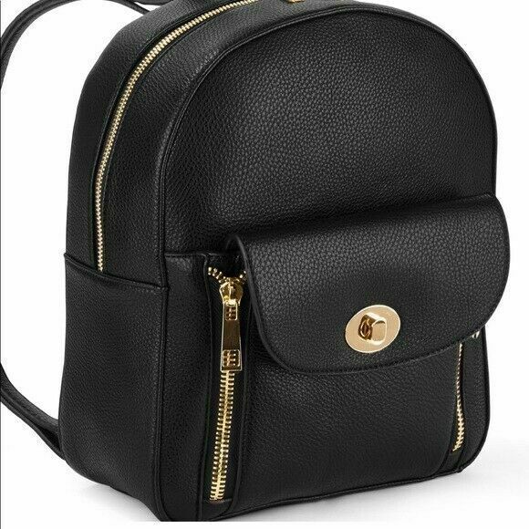 *SALES TAX NOW CHARGED ON ALL ORDERS!* ITEM IS NEW & IN OPENED PACKAGING. PACKAGING OPENED FOR INSPECTION. ITEM IS IN PERFECT CONDITION.  This mini backpack is extremely stylish with its novelty hardware pocket and easy zipper access. Pebble grain man-made material. Shiny gold hardware finish. Beautiful front pocket detail features with functioning turn lock closure and two decorative zippers, adjustable shoulder strap’s 100% polyester self color lining. LOCATION: 7-BACKPACK9 7-BACKPACK 17 J Elegant Leather Backpack With Zipper For School, Sales Tax, Mini Backpack, Pocket Detail, Gold Hardware, Front Pocket, Fashion Backpack, Shoulder Strap, Grain