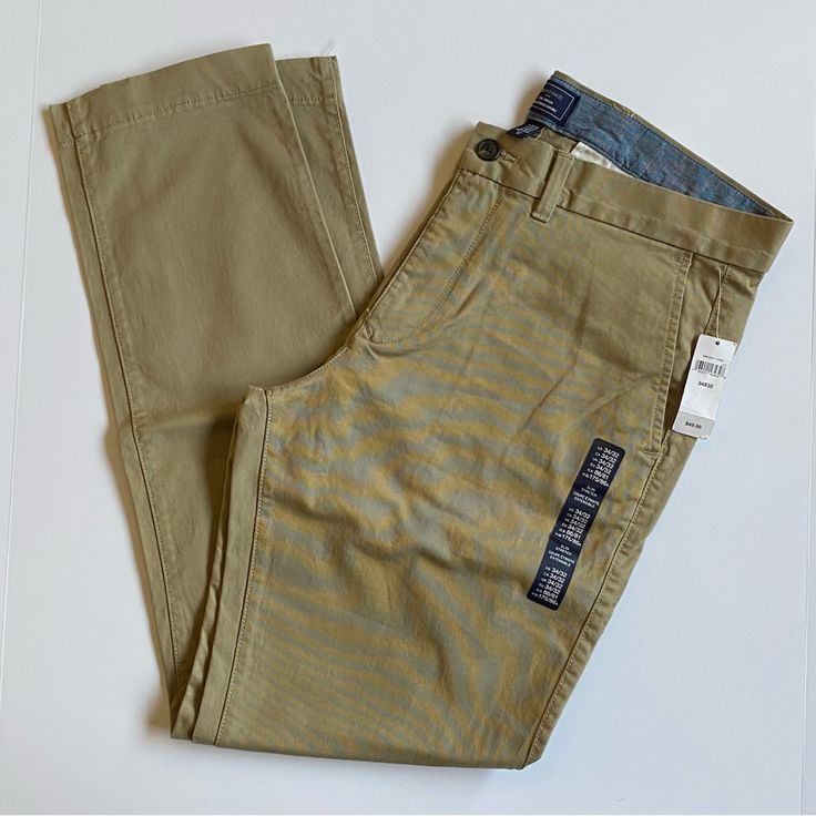 Gap Khakis Size 34 X 32 Men’s Nwt Brand New “Slim Stretch” Beige Tan Mens Pants. Goes With Everything! Classic Gap Bottoms With Welt Pockets, Classic Gap Bottoms With Five Pockets, Gap Straight Leg Business Casual Pants, Classic Gap Tapered Leg Pants, Classic Tapered Leg Pants By Gap, Classic Slim Cotton Pants, Classic Tapered Leg Gap Pants, Gap Straight Leg Cotton Pants, Gap Cotton Straight Leg Pants