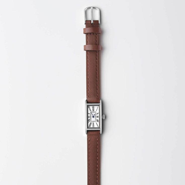 Kimsey Watch in Gold | Classic, small gold watch for women – March Hare Timeless Square Watch Accessories For Formal Occasions, Classic Square Watch For Formal Occasions, Classic Square Watches For Formal Occasions, Classic Square Formal Watches, Classic Brown Watch Accessories With Rectangular Dial, Classic Square Watches With Diamond Hour Markers, Classic Brown Rectangular Watch, Timeless Rectangular Watch Bands For Business, Brown Watch With Diamond Hour Markers, Rectangular