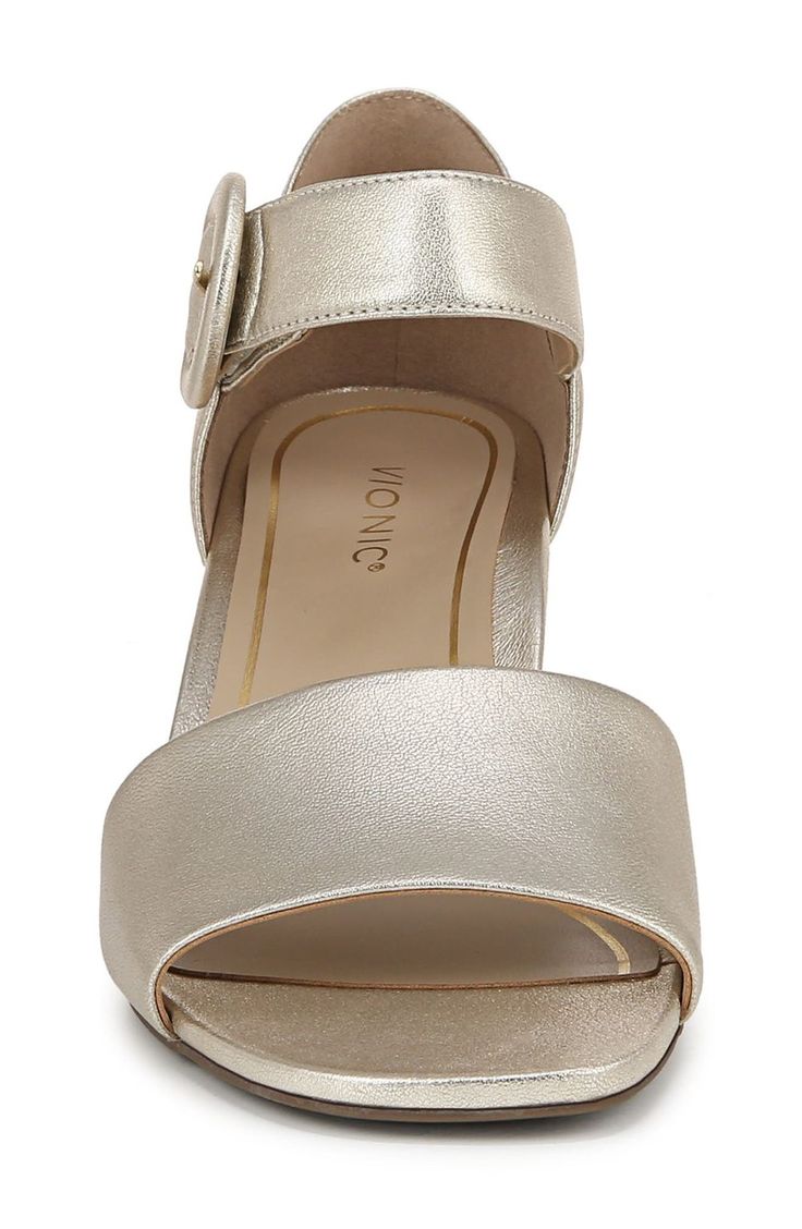 A contoured footbed comforts every step you take in this day-to-night sandal crafted in metallic leather. Built-in VIO MOTION technology means shock-absorbing cushioning, a stability and forefoot flexibility, while Meta Dome technology ensures even contact across your foot to reduce pressure. 2 1/2" heel Adjustable ankle strap with buckle closure Cushioned footbed with arch support Leather upper/synthetic lining and sole Imported American Podiatric Medical Association (APMA) Seal of Acceptance Metallic Leather Sandals With Single Toe Strap, Metallic Leather Ankle Strap Sandals, Gold Metallic Leather Open Toe Sandals, Metallic Open Toe Leather Sandals, Metallic Open Toe Sandals, Metallic Leather Open Toe Sandals, Gold Leather Sandals With Arch Support, Silver Ankle Strap Sandals With Cushioned Footbed, Metallic Leather Sandals With Open Heel