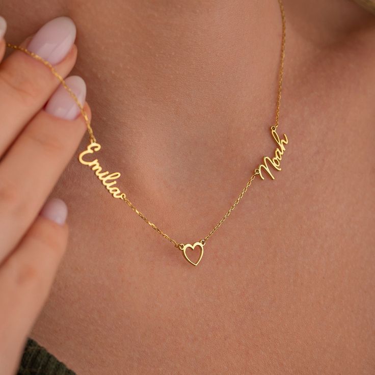 "TWO NAME NECKLACE With Heart, Baby Name Necklace Surprise discounts are waiting for you inside the box! S H O W ∙ Y O U R ∙ S T Y L E 𝒰 𝒩 𝐼 𝒬 𝒰 𝐸 ♥ Customize your jewelry only for yourself and create your design. Wear it either for everyday use or for special occasions. 𝒫 𝐸 ���𝑅 𝐹 𝐸 𝒞 𝒯 ∙ 𝒢 𝐼 𝐹 𝒯 ♥ Make your friends or family happy with this exclusive gift. 𝑀 𝐼 𝒩 𝐼 𝑀 𝒜 𝐿 𝐼 𝒮 𝒯 ∙ 𝒟 𝐸 𝒮 𝐼 𝒢 𝒩 ♥ Wear this jewelry with joy and show your style with wonderful designs of Couples Friends, Necklace With Heart, Chrismas Gifts, Custom Kids, Exclusive Gift, Christmas Gift Jewelry, Special Jewelry, Christmas Gifts For Women, Necklace Personalized