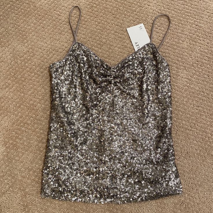 Sequined Spaghetti Strap Tank Top Never Worn Nwt. Perfect For Nye! Ruched Spaghetti Strap Tank Top For Party, Party Ruched Spaghetti Strap Tank Top, Ruched Camisole Top For Party, Ruched Spaghetti Strap Top For Night Out, Ruched Camisole Tank Top For Party, Chic Ruched Camisole For Night Out, Ruched Tank Top For Party, Glamorous Fitted Spring Camisole, Elegant Ruched Tank Top For Party