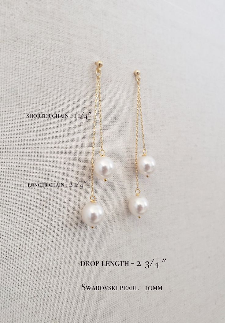 "Long Double Pearl Drop Earrings. Pearl Threaders. Pearl Chain Earrings. Bridal Earring. Wedding Jewelry. Bridesmaid Gift Set of 6. Wife Gift These delicate earrings are simple and yet elegant. Two dancing pearls are dangling from two dainty chains. These exquisite double drop earrings hang a stunning 3 inches. They will turn the heads of everyone as you walk into a room wearing them. They are so comfortable and lightweight you will forget you have them on.You'll want to wear them everyday with White Pearl Earrings With Adjustable Chain For Gift, Gift White Pearl Earrings With Adjustable Chain, Delicate White Earrings With Adjustable Chain, Dainty White Dangle Bridal Earrings, White Dangle Bridal Earrings, White Dangle Jewelry For Bridal Shower, Classic Pearl Chain Linear Earrings For Wedding, White Drop Earrings For Bridal Shower, Classic Pearl Chain Bridal Earrings For Anniversary