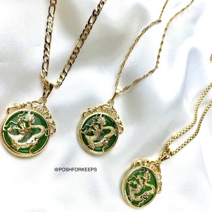 DESCRIPTION: Channeling prosperity and good luck fortune, our 18K Gold Plated Jade Dragon Necklace features the Chinese symbol for fortune over the circular Jade dragon medallion pendant. Attract all the right vibes with this one! MATERIAL: 18K Gold Plated over Stainless Steel. Hypoallergenic, Tarnish Free and Water Resistant. LENGTH: Multiple chain options and sizes available for selection above. Pendant: 1.25 inch Mix and match with any of our 18K Gold Necklaces and Anklets to create the most Gold Dragon Design Round Pendant Jewelry, Gold Round Pendant With Dragon Design, Traditional Gold Jewelry With Dragon Design, Spiritual Gold Jewelry With Dragon Design, Gold Jade Round Pendant Necklace, Gold Jade Necklace With Round Pendant, Traditional Round Jewelry With Dragon Design, Gold Round Jewelry With Dragon Design, Gold Jewelry With Dragon Design