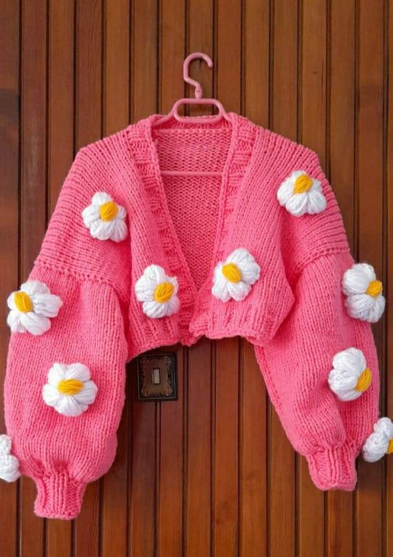 Hand Knitted Acrylic Outerwear For Spring, Spring Hand Knitted Acrylic Cardigan, Spring Chunky Knit Acrylic Sweater Coat, Spring Acrylic Cable Knit Cardigan, Spring Cable Knit Acrylic Cardigan, Hand Knitted Acrylic Sweater For Spring, Cozy Hand Knitted Sweater Coat For Spring, Handmade Acrylic Cardigan For Spring, Spring Acrylic Yarn Knitted Cardigan