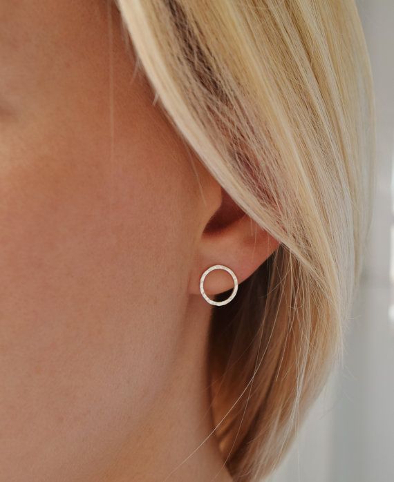 Dimple-hammered Silver Circle Studs - Open Circle Earrings - UK Handmade  Simple yet sophisticated! The simple shape and clean lines make these earrings perfect for everyday wear while the dimple-hammered finish creates subtle facets that reflect the light and draw the eye!  Whenever and wherever, they are sure to give your look a little boost! Also available with a dash-hammered finish, equally as pretty but giving a slightly more edgy feel;  https://www.etsy.com/uk/listing/276068996/open-c... Classic Circular Earrings, Classic Circular Earrings For Pierced Ears, Single Circle Earring For Anniversary, Dainty Circular Earrings, Dainty Circle Earrings For Pierced Ears, Everyday Hammered Earrings, Hammered Earrings For Everyday Wear, Gift Single Open Circle Earring, Hammered Open Circle Earrings For Everyday