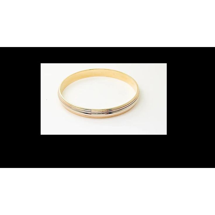 Cartier 18k Tricolor Gold Slip-On Bangle Bracelet 1990       About Cartier: The company has a long and distinguished history of serving royalty, as well as stars and celebities. One Prince of Wales hailed Cartier as "Joaillier des Rois, Roi des Joailliers" (Jeweller to Kings, King of Jewellers"). Cartier received an order for 27 tiaras for the coronation of the future King. King Edward VII was crowned in 1902 and in 1904 he honoured the Company with the Royal warrant of supplier to the Royal Cou Cartier Gold Bracelets For Anniversary, Gold Cartier Bracelet For Anniversary, Gold Cartier Bracelets For Anniversary, Cartier Gold Jubilee Bracelet For Wedding, Cartier Jubilee Gold Bracelet, Classic Gold Cartier Bangle, Cartier Yellow Gold Bangle, Cartier Yellow Gold Round Bangle, Cartier Gold Bracelet With 17 Jewels For Anniversary