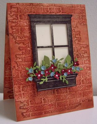 a card with a window and flowers on it