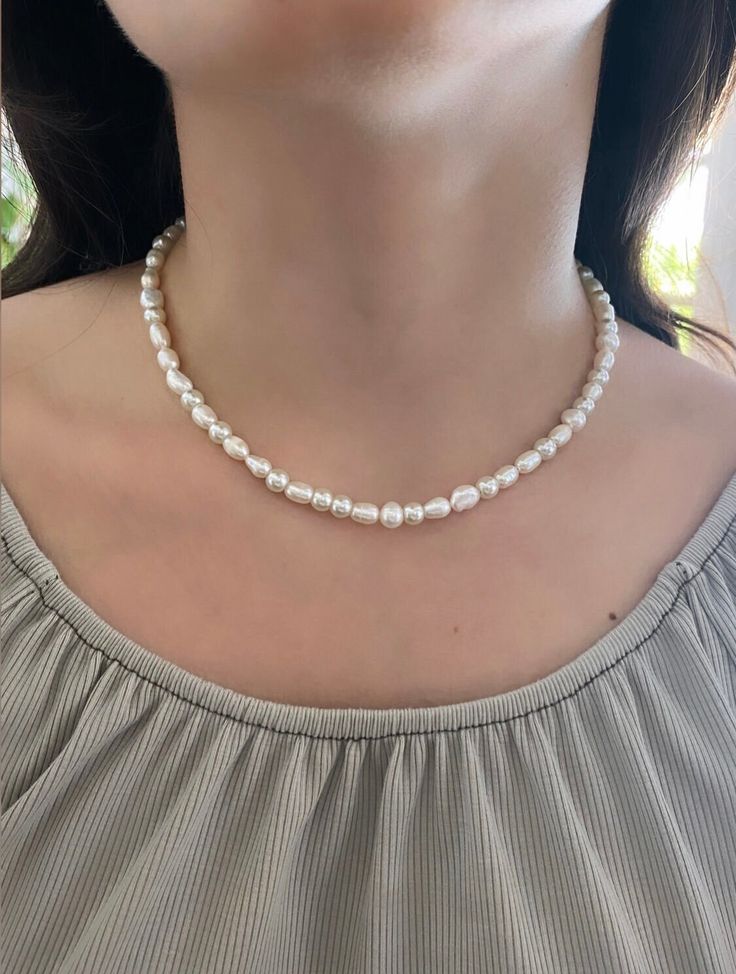 ♥This classic freshwater pearl necklace is a must-have! It's a stylish staple that elevates any outfit. The mix of different sized pearls makes each necklace unique to you!  ♥MATERIAL - The pearls are real freshwater pearls mixed with high-quality glass pearls. ♥NECKLACE LENGTH: 14 inches - We add a 2in extender chain at the end to make the necklace adjustable (14 inches - 16 inches or 16 inches - 18 inches) - If you would like a different length, feel free to send me a message! ♥CARE TIPS - Avoid contact with perfumes, body oils, and other chemicals, including household cleaners - Never use chemical jewelry cleaners as these will do more harm than good. - For light cleaning, gently polish with a soft, lint-free cloth to avoid scratching. - Store it in a cool dry place. ♥Delicately handmad Cheap White Beaded Necklace With Pearl Pendant, Round Beads Pearl Necklace, Everyday Beaded Pearl White Pearl Necklace, Everyday Round Beads Pearl Necklace, Everyday Beaded Necklaces With Pearl Pendant, Everyday Pearl Pendant Beaded Necklace, White Pearl Necklace For Everyday, Everyday White Pearl Necklace, Beaded Necklace With Pearl Pendant