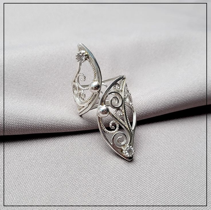 Original shaped artisan filigree ring, 925 Sterling Silver Elegant White Gold Filigree Jewelry, Elegant Sterling Silver Jewelry In Silver, Elegant Silver Sterling Silver Jewelry, Elegant Adjustable Filigree Jewelry, Exquisite White Gold Filigree Jewelry, Heirloom Silver Filigree Ring With Intricate Design, Sterling Silver Jewelry With Unique Design For Anniversary, White Gold Jewelry With Unique Design For Wedding, White Gold Wedding Jewelry With Unique Design