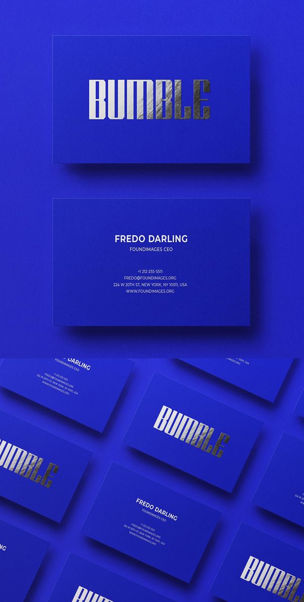 blue business cards with gold foil lettering on the front and back, against a bright blue background