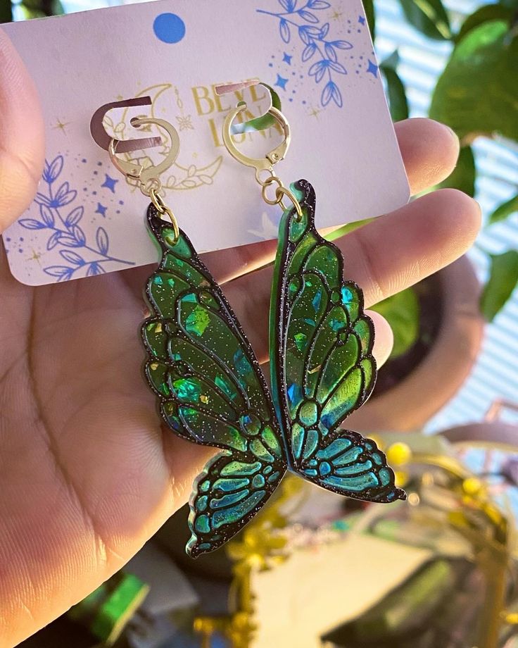 Elevate your style with our exquisite Wing Earrings Collection - a mesmerizing fusion of elegance and whimsy. Crafted with meticulous attention to detail, these earrings come in various styles, each inspired by different critter wings. Handcrafted with precision, our earrings are made to stand out. The lightweight design ensures comfort, allowing you to flutter through your day with ease. 🦋 Embrace the magic of transformation and adorn yourself with these stunning wing earrings. Choose your favorite color and style to reflect your individuality. Elevate your jewelry collection with the allure of nature's beauty. 💖🌿 Fairy Wing Earrings, Moth Wings, Insect Wings, Butterfly Wing Earrings, Piercing Ideas, Butterfly Wing, Funky Jewelry, Pretty Clothes, Wing Earrings