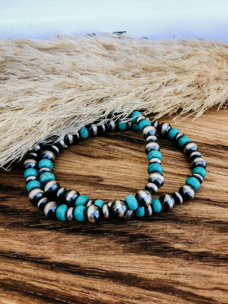 Genuine Navajo Pearls Genuine Turquoise Adjustable Stretch Bracelet Rustic Turquoise Bracelet Jewelry, Rustic Turquoise Bracelet, Handmade Western Turquoise Bracelets, Handmade Western Turquoise Bracelet, Handmade Western Style Turquoise Bracelet, Artisan Turquoise Bracelets With Large Beads, Turquoise Stretch Bracelet With Silver Beads, Southwestern Blue Beaded Bracelets, Southwestern Turquoise Hand-strung Bracelets