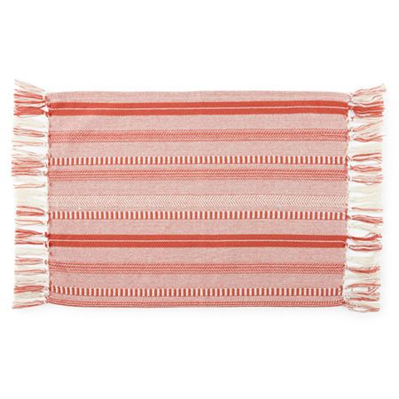 an orange and white striped rug with fringes on the bottom, in front of a white background