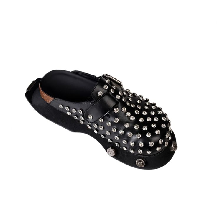 Upgrade your comfort game with our Leather Thick Sole Retro Slippers. These stylish slippers feature a durable leather sole that provides ultimate support and stability, making them perfect for all-day wear. - Color: Black- Style: Slippers- Closure Type: Slip On- Upper Material: PU- Sole Material: Rubber- Toe Style: Round Toe- Occasion: Casual- Gender: Women Black Leather Slip-on Shoes With Studded Rubber Outsoles, Synthetic Mules With Leather Sole And Flat Heel, Synthetic Round Toe Slip-ons For Streetwear, Leather Slip-on Sandals With Studded Rubber Outsoles, Leather Shoes With Studded Rubber Outsoles And Round Toe, Casual Platform Slippers With Leather Footbed And Round Toe, Black Leather Slip-ons With Flat Heel, Black Slip-on Platform Slippers With Rubber Sole, Slip-on Slippers With Rubber Sole And Round Toe