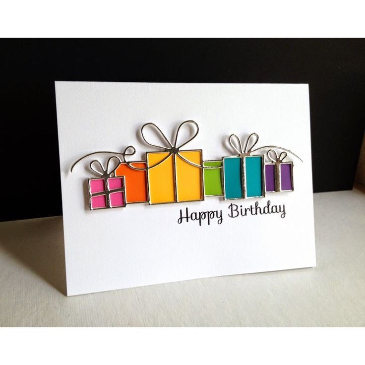 a happy birthday card with colorful gift boxes