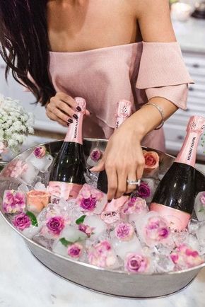 two pictures one is champagne and the other has flowers in ice with straws on them