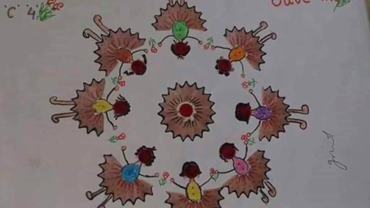 an image of a drawing on paper with flowers and leaves in the shape of a circle