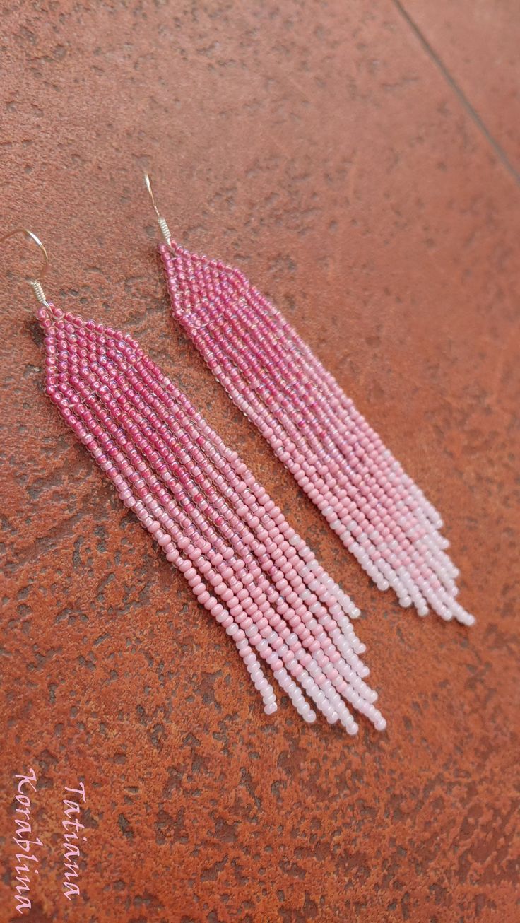 These unique handmade earrings are made of high-quality Czech beads and strong synthetic thread. They are elegant, fashionable, and highly versatile, suitable for everyday wear. Color:pink . 100% hand made with love! Measurements: Length-about 11.5cm (4.33 inch) Width -about 2 cm (0.79 inch) Materials: Sterling silver components Czech glass beads Nylon Thread Elegant Pink Earrings With Beaded Fringe, Elegant Pink Beaded Fringe Earrings, Pink Beaded Earrings With Fringe, Elegant Pink Chandelier Earrings With Colorful Beads, Pink Beaded Fringe Earrings With Round Beads, Pink Beaded Chandelier Earrings, Pink Tassel Beaded Earrings For Summer, Pink Beaded Tassel Earrings For Summer, Pink Bohemian Tassel Dangle Earrings