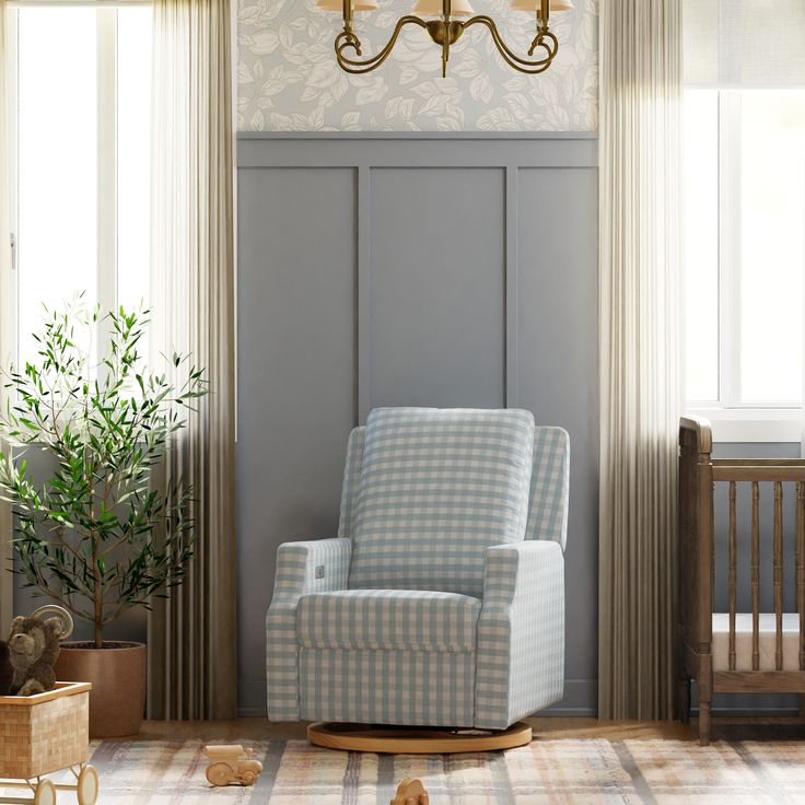 a baby's room with a rocking chair and crib