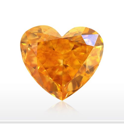 an orange heart shaped diamond on a white background