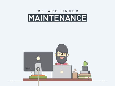 a man sitting at a desk in front of a computer with the words we are under maintenance