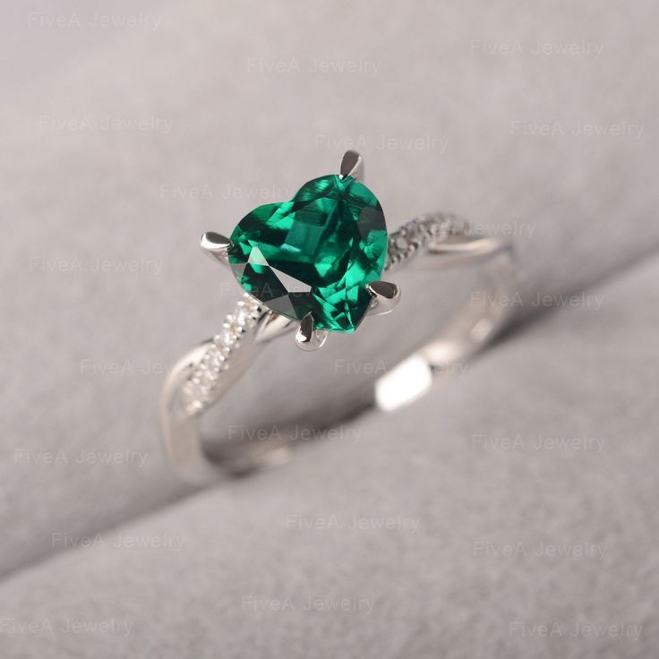 ◆ The ring is handcrafted from sterling silver and decorated with a dazzling 8*8 mm Lab Grown Emerald and CZs. It is suitable for engagement/anniversary/daily occasion. ◆ Production Description: Main stone Type: Lab Grown Emerald Main Stone Shape: Heart Cut Main Stone Size: 8*8 mm(1.59ct) Side stone: CZ Metal: 925 Sterling silver - Other options available in the drop down menu ◆ Customization: √Free for Add Engraving √Other Metal Type Available √Other Gemstones & Shapes Available √Personaliz Silver And Green Rings, Moissanite Heart Cut Diamond Ring For Proposal, Heart Cut Moissanite Diamond Ring For Proposal, White Gold Emerald Promise Ring Fine Jewelry, Moissanite Heart Cut Ring With Halo Setting, Heart Cut Moissanite Ring With Halo Setting, Fine Jewelry Emerald Promise Ring With Center Stone, Fine Jewelry Emerald Ring With Center Stone For Promise, Promise Rings With Brilliant Cut May Birthstone