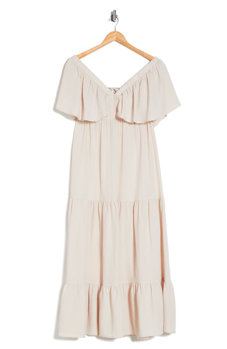 An open back enhances the breezy, boho vibe of a flutter-sleeve maxi dress fashioned in a crinkled, tiered silhouette. 56" length Ties in back Deep V-neck Short sleeves Unlined 96% polyester, 4% elastane Hand wash, line dry Imported Billowy V-neck Maxi Dress For Summer, Spring Bohemian Chiffon Midi Dress, Breezy Summer Maxi Dress With Ruffles, Flowy Short Sleeve Maxi Dress In Breezy Style, Flowy Breezy Short Sleeve Maxi Dress, Flowy Rayon Maxi Dress For Casual Occasions, Flowy Rayon Maxi Dress For Casual Wear, Breezy Flowy Maxi Dress With Short Sleeves, Flowy Breezy Maxi Dress With Short Sleeves