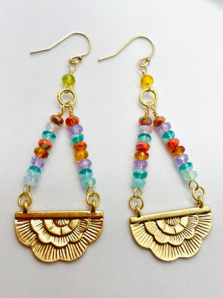 These handmade earrings feature multi-colored glass beads, brass connectors, and topped with a small crystal.  They are strung on gold-filled earring wires and measure just under 2-3/4" from the top of the earrings wires. Bohemian Gold Beaded Earrings With Ear Wire, Gold Bohemian Beaded Earrings With Ear Wire, Bohemian 14k Gold Filled Beaded Dangle Earrings, Bohemian 14k Gold-filled Beaded Dangle Earrings, Nickel Free Gold Earrings With Czech Glass, Nickel-free Gold Earrings With Czech Glass, Wire Wrapped Czech Glass Teardrop Beaded Earrings, Bohemian 14k Gold Filled Beaded Earrings, Bohemian 14k Gold-filled Beaded Earrings