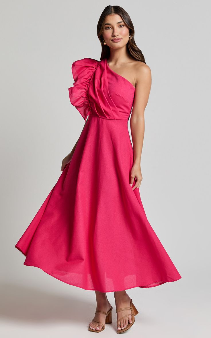 Get ready to turn heads in the Dixie Midi Dress - Linen Look One Shoulder Ruffle Dress In Raspberry. This stunning pink A-line dress is designed with a flattering one-shoulder neckline and playful ruffle detailing, making it perfect for your next party or special occasion. Made from high-quality cotton, this dress not only looks stylish but feels comfortable too. The midi length adds an elegant touch that can easily be dressed up or down. Embrace your unique style and make a statement with the D Feminine One-shoulder Ruffled Dress For Spring, Feminine One Shoulder Ruffle Dress For Spring, Feminine Spring One Shoulder Dress With Ruffles, Feminine One-shoulder Spring Dress With Ruffles, Feminine Spring One-shoulder Dress With Ruffles, Chic Pink One-shoulder Asymmetrical Dress, Pink One-shoulder Dress For Spring Party, Pink One Shoulder Dress For Spring Party, One Shoulder Midi Dress With Ruffles