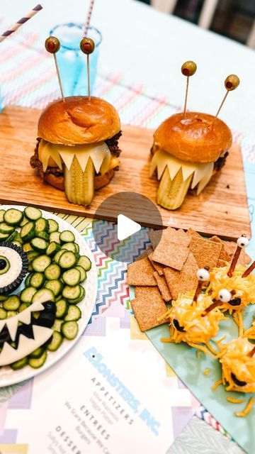 some food that is on top of a wooden board with pins stuck to it's sides