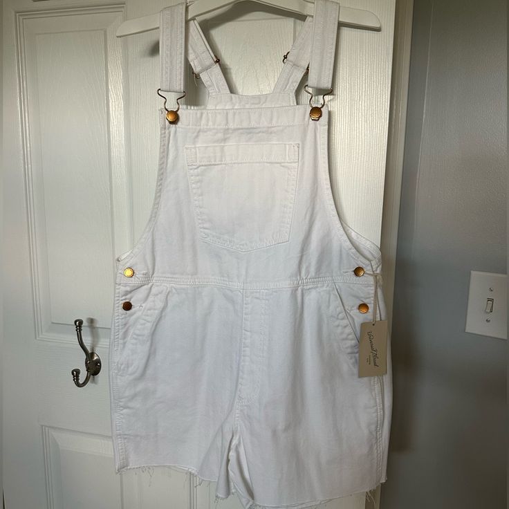 Never Worn White Overalls White Cotton Overalls With Relaxed Fit, Casual White Relaxed Fit Overalls, Casual White Cotton Shortalls, White Spring Shortalls Overall, Sleeveless White Cotton Overalls, White Casual Shortalls For Summer, White Casual Shortalls For Spring, White Overalls For Day Out, Casual White Shortalls For Spring