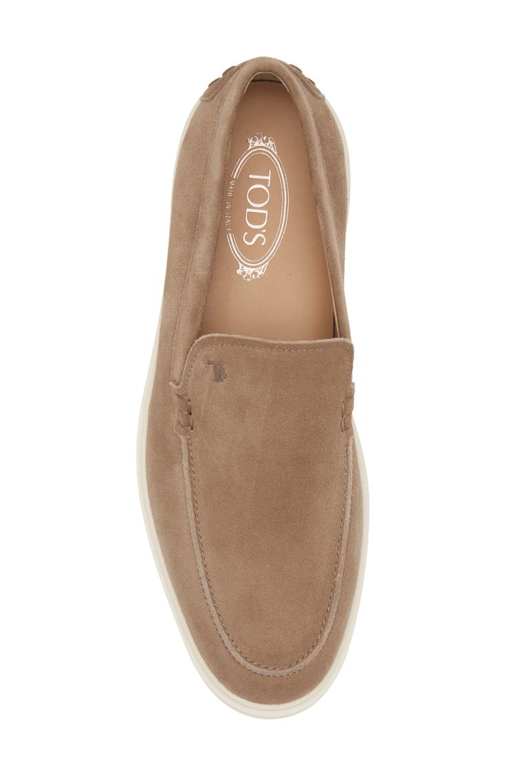 The Italian fashion house known for artisanal elegance brings their quality craftsmanship to a timeless suede loafer stamped with an understated logo monogram. Leather upper and lining/rubber sole Made in Italy Designer Shoes Luxury Suede Slip-ons With Textured Sole, Elegant Calf Leather Slip-ons With Suede Lining, Luxury Plain Toe Slip-ons, Luxury Slip-ons With Suede Lining, Luxury Slip-ons With Stitched Sole And Plain Toe, Luxury Slip-on Suede Moccasins, Designer Slip-on Moccasins With Suede Lining, Designer Suede Loafers With Textured Sole, Luxury Slip-on Moccasins With Suede Lining