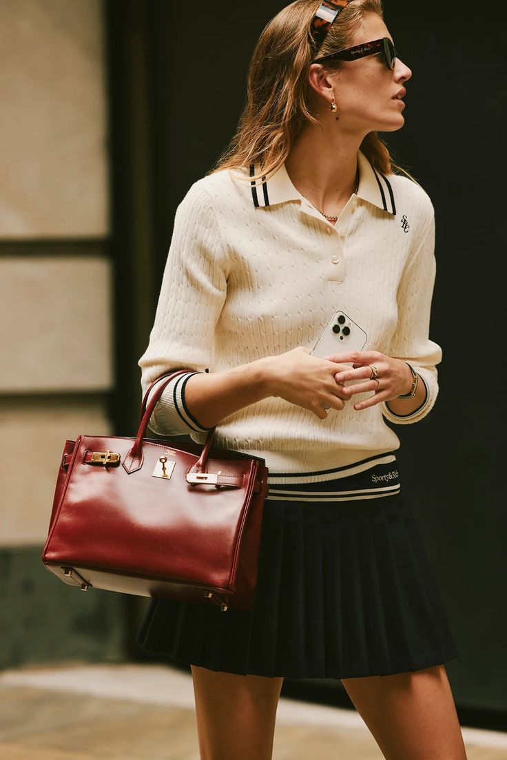 Wall Street Drop – Sporty & Rich English Preppy Style Women, Preppy Fashion Aesthetic, Pleated Skirt Street Style, Wall Street Fashion, Preppy Athleisure, Money Photoshoot, Sweater Styling, Pleated Skirt Pattern, Classic Preppy Style