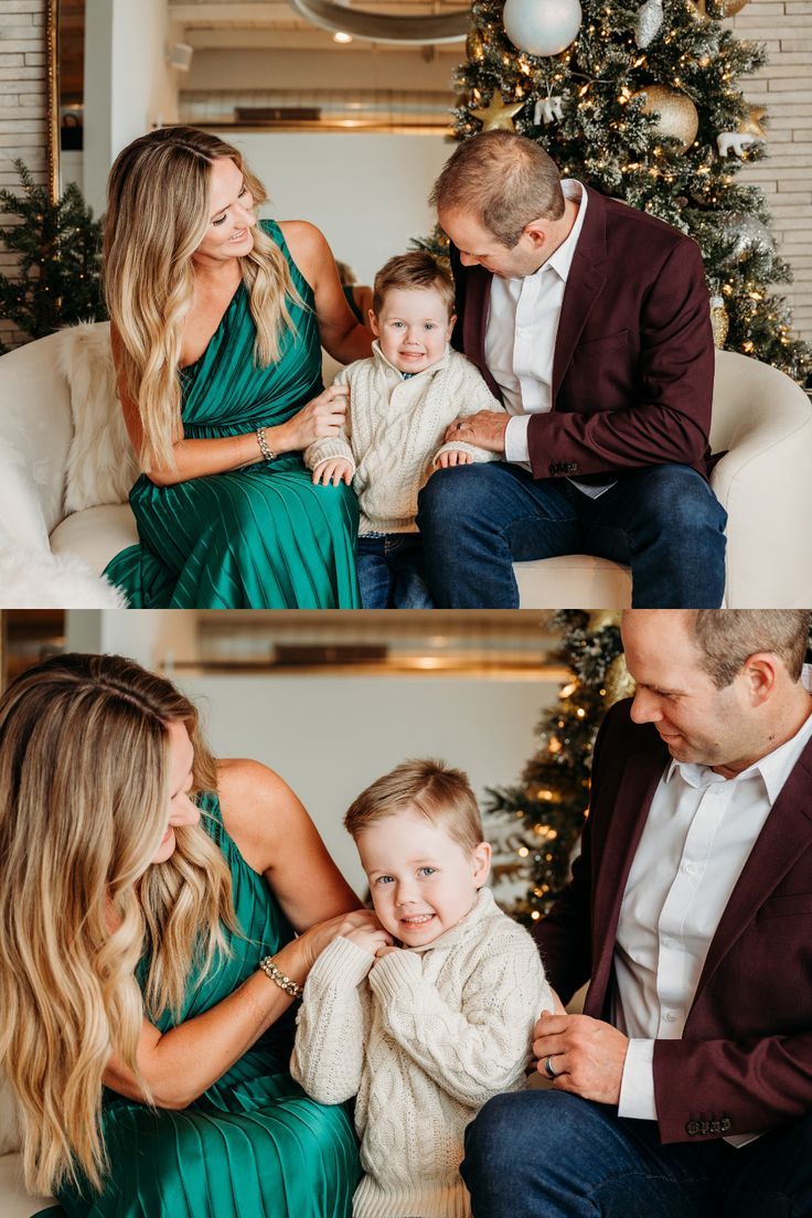 a man and woman holding a baby in front of a christmas tree with other family photos