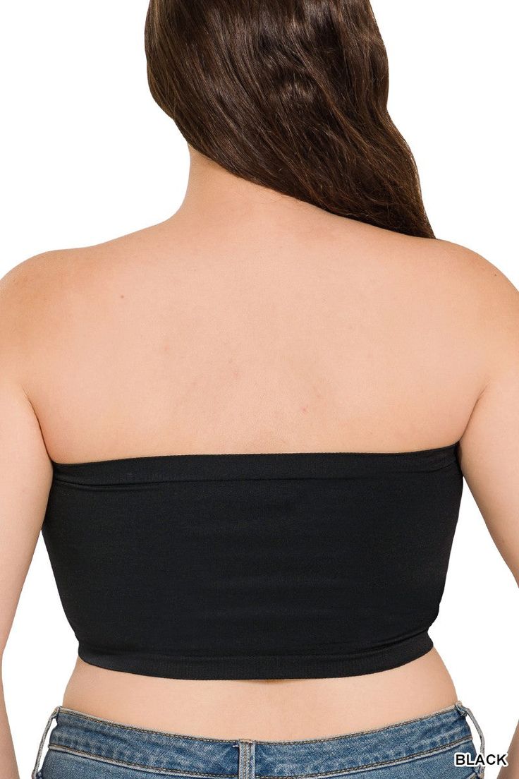 Details: Introducing the Morrina seamless bandeau top, your new wardrobe essential. This versatile top comes in classic black or white, offering endless styling options. With its seamless design, it provides a smooth and comfortable fit. Perfect for any occasion, this bandeau top is a must-have for effortless style. - Seamless Content:92% Nylon 8% SpandexSize + Fit- Model is 5'8" and wearing a OS- Measurements from a size OS- Full length: 7"- Chest:22'' Versatile Micro-elastic Seamless Top, Seamless Micro-elastic Versatile Top, Black Bandeau Tube Top With Built-in Bra, Black Stretch Tube Top With Built-in Bra, Black Bandeau Crop Top With Built-in Bra, Versatile Black Tube Top With Built-in Bra, Strapless Solid Color Tube Top, Bra Friendly, Strapless Solid Color Bra-friendly Tube Top, Strapless Solid Color Tube Top Bra Friendly