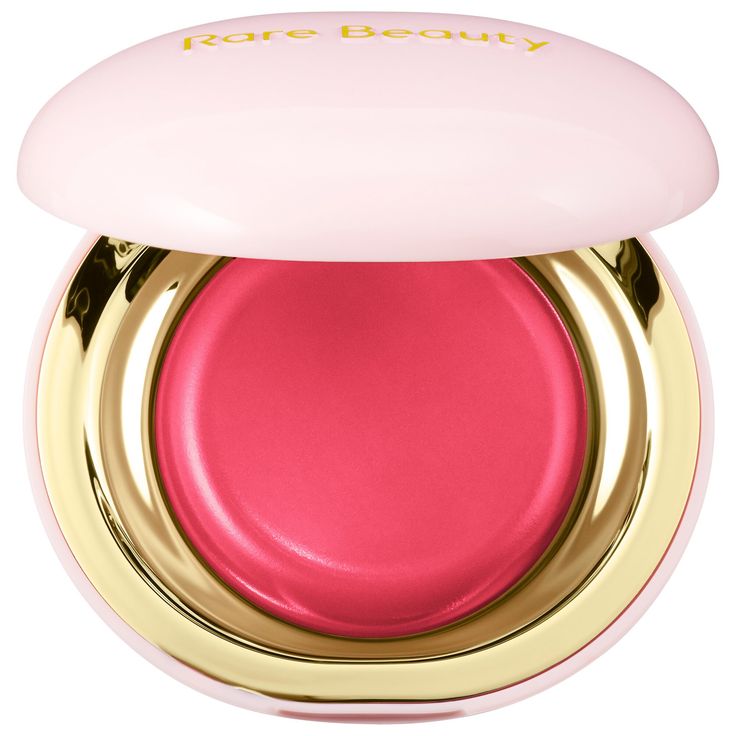 A breakthrough, mistake-proof, liquid-like cream blush that melts into a second skin for the most natural-looking wash of soft-focus color. Ingredient Callouts: Free of parabens, formaldehydes, formaldehyde-releasing agents, phthalates, mineral oil, and sulfates SLS & SLES. It is also cruelty-free.What Else You Need to Know: This first-of-its-kind water-resistant blush combines pigments with a non-greasy blend of weightless oils and spherical powders for a natural flush you can’t mess up. The ultralightweight, liquid-like cream melts on contact and blends to a smooth, satin finish that won’t cake, crease, or clog pores. Glossier Lip Balm, Rare Beauty By Selena Gomez, Sephora Beauty, Rare Beauty, Liquid Eyeshadow, Cream Blush, Glossy Lips, Fenty Beauty, Beauty Box