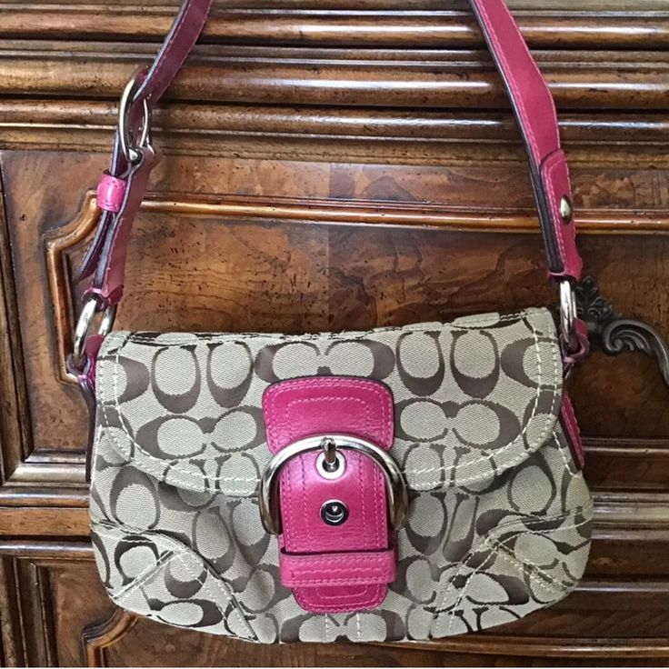 Coach Handbag Purse F11860 Hobo Shoulder Bag Buckle Flap Signature. This Bag Is In Great Condition . I Can Not See Any Wear To Outside Fabric Or Leather . There Is A Stain Inside That Might Probably Be Cleaned , Refer To The Picture . Height:6.7inch/17cm Width:10.2inch/26cm Depth:2.0inch/5cm Shoulder:20.1inch/51cm. Measurements Are Approximate. Inside: Interior Zip Pocket X 1, Open Pocket X 3 Magnetic Button Closure Coach Shoulder Bag With Silver-tone Hardware, Coach Crossbody Bag With Silver-tone Hardware, Coach Pink Bags With Silver-tone Hardware, Coach Satchel With Detachable Strap In Pouch Shape, Coach Satchel Shoulder Bag With Handles, Coach Satchel Shoulder Bag With Adjustable Strap, Coach Shoulder Bag With Detachable Strap, Coach Hobo Bag With Detachable Handle, Rectangular, Coach Rectangular Hobo Bag With Detachable Strap