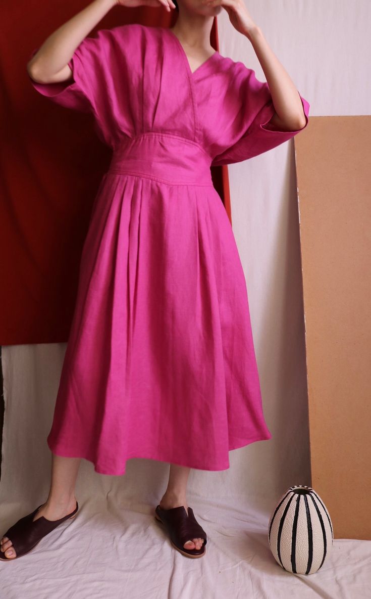 Details Linen faux-wrap dress with basque waist (semi-elasticated). No lining.Made-to-order. Ship in 15-18 days.  Color/Couleur: Raspberry Pink( Please convo us for more colour options.) Material:100% linen  Size/Taille:  Made-to-measure. Please provide bust/waist/hips size and height during checkout.  Length:115cm  Model is 163 cm/ 47kg with 33' bust/ 25' waist/35'  hips.  Care instructions/Entretien:Cold handwash and air-dry. Do not soak. Follow us on instagram (@metaformose) for all the lates Chic Summer Midi Dress With Box Pleat, Summer Dresses With Pleated Sleeves In Relaxed Fit, Summer Dresses With Pleated Sleeves And Relaxed Fit, Knee-length Box Pleat Pleated Summer Dress, Summer Knee-length Box Pleat Pleated Dress, Summer Knee-length Midi Dress With Box Pleat, Linen Dress With Gathered Waist For Daywear, Chic Summer Pleated Dress With Box Pleat, Spring Linen Pleated Dress