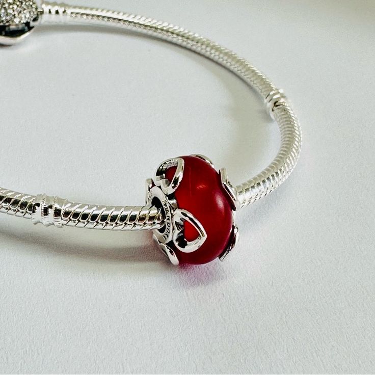 Pandora Frosted Red Murano Glass Bead Red Pandora Charms, Elegant Heart Beads For Gifts, Red Spacer Beads Jewelry Gift, Red Spacer Beads Jewelry As Gift, Red Beaded Bracelets With Spacer Beads As Gift, Red Heart Beads For Jewelry Making, Elegant Red Beaded Bracelets With Heart Beads, Red Heart Beads For Gifts, Red Bracelets With Spacer Beads As Gift