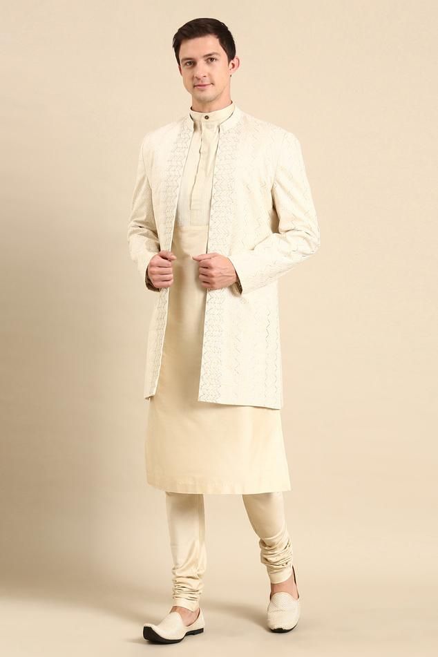 Ivory sleeveless Nehru jacket with chevron jacquard woven motifs.
Components: 1
Pattern: Woven
Type Of Work: Chevron
Neckline: Mandarin collar
Sleeve Type: Sleeveless
Fabric: Silk Jacquard
Color: Ivory
Other Details: 
Note: Inner kurta and churidar worn by the model is not for sale
Occasion: Sangeet - Aza Fashions Nehru Jacket For Men, Rohit Bal, Nehru Jacket, Tarun Tahiliani, Nehru Jackets, Ivory Silk, Jacket For Men, Fashion App, Fabric Silk