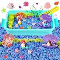 an ocean play set with mermaids and fish