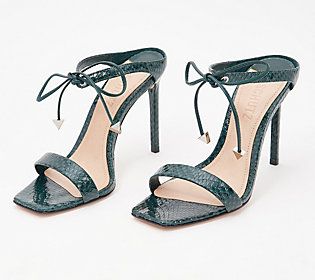 These leather heeled mule sandals are flirty and stylish, providing your daily shoe collection with a stunner that all your OOTDs will want to meet. From Schutz. Luxury High Heels For Spring, Summer Sandals With Sculpted Heel For Night Out, Summer Night Out Sandals With Sculpted Heel, Summer Date Night Heels, Summer Mules With 4-inch Heel And Open Heel, Summer High Heel Date Night Heels, Summer Open Toe Heels For Date Night, Summer Heels With Heel Strap For Date Night, Chic Summer Sandals For Date Night