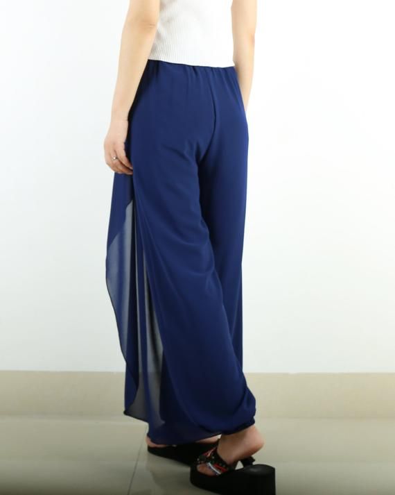 * Beautiful pearl chiffon pants, very comfortable to wear, not easy to get wrinkled, very easy to take care of.* Add an asymmetric layer on the front, very unique and beautiful.* Material: outer-pearl chiffon, lining-100% polyesterCustom made to fit, lead time is 6-8 days;Let us know your usual size in your country and your overall height.If you have some specific request or special characters such as broad shoulder, long arms, long waist, etc you think we need pay attention to when making, do l Summer Evening Wide Leg Full Length Pants, Summer Evening Wide Leg Pants, Elegant Summer Pants With Elastic Waistband, Elegant Beach Bottoms With Elastic Waistband, Summer Evening High-waisted Wide Leg Pants, Wide Leg Pants For Evening In Summer, Wide Leg Pants For Summer Evenings, Elegant Wide-leg Harem Pants With Elastic Waistband, Versatile Full Length Summer Wide Leg Pants