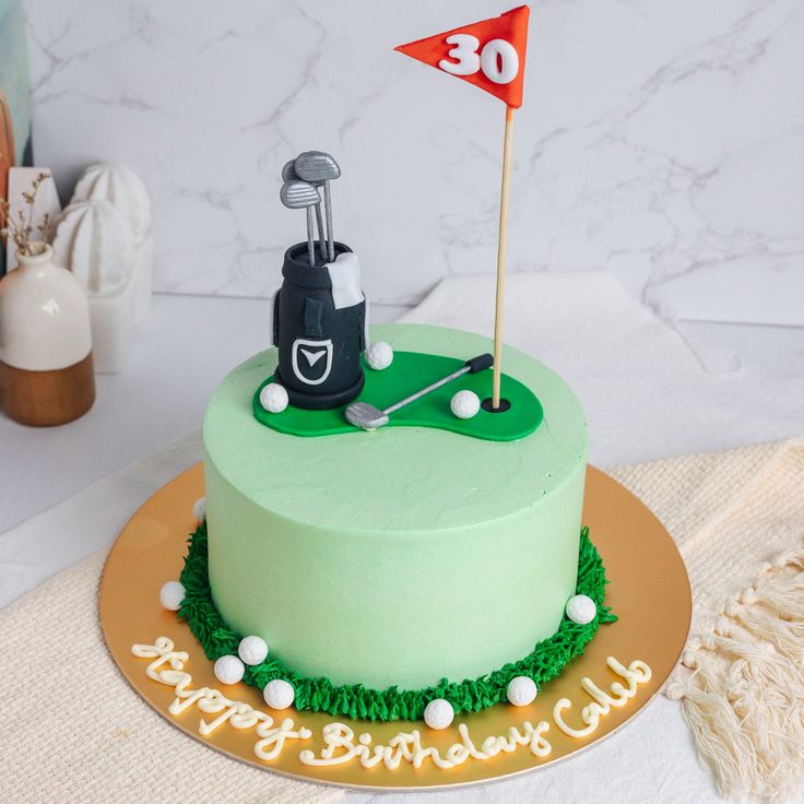 a birthday cake with a golf theme on it