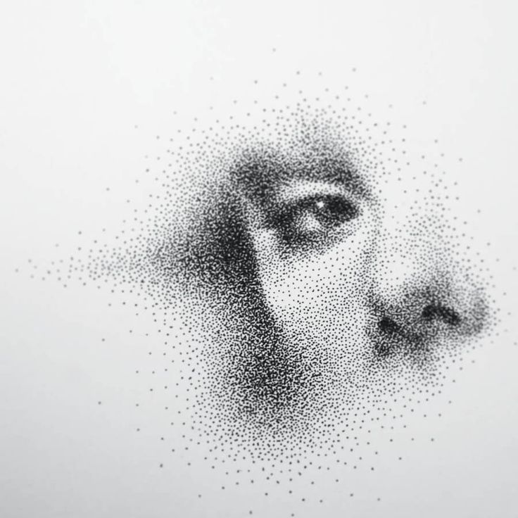 a woman's face made up of small dots