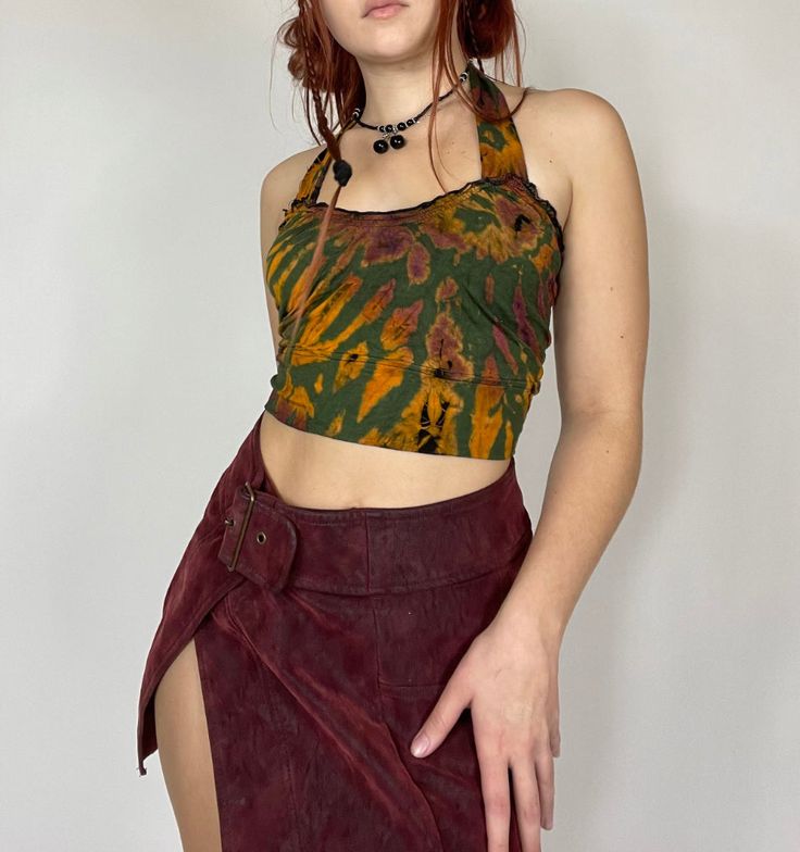 Tie Dye lettuce hem halter top in green! Size small. Colorings and patterns will vary in each top! Green Trendy Cami Crop Top, Trendy Green Cami Crop Top, Summer Y2k Halter Camisole Top, Y2k Style Summer Halter Camisole Top, Y2k Sleeveless Halter Top For Vacation, Green Y2k Cami Top, Green Camisole Crop Top For Spring, Hippie Halter Neck Crop Top, Green Stretch Summer Crop Top