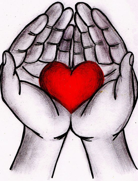 two hands holding a red heart in front of their palms, with one hand over the other