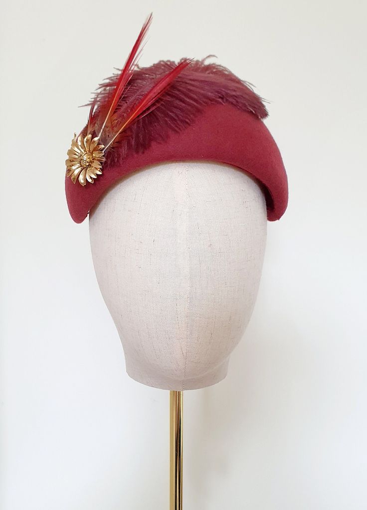 Little Hats for Grand Occasions. Customer information and sizing. Beautiful rust brown/tawny brown statement feather and vintage gem style brooch embellished felt half hat/capulet hat. Unique 1940s 50s inspired rust brown wool felt half hat. Theses are one off hand made pieces. Perfect to complete your vintage outfit. Embellishments, feathers, buttons and pre-loved brooches are lovingly sourced for unique individual pieces. Half hat measures 19cm in lenght and 13cm at it's widest point. This hal Adjustable Vintage Hats For Races, Vintage Top Hat With Short Brim For Races, Adjustable Vintage Fascinator For Races, Vintage Fascinator Hat For Races, Retro Mini Hats With Short Brim For Vintage Events, Vintage Short Brim Top Hat For Races, Vintage Costume Hats With Curved Brim For Races, Vintage Fascinator For Royal Ascot Races, Vintage Adjustable Fascinator For Races